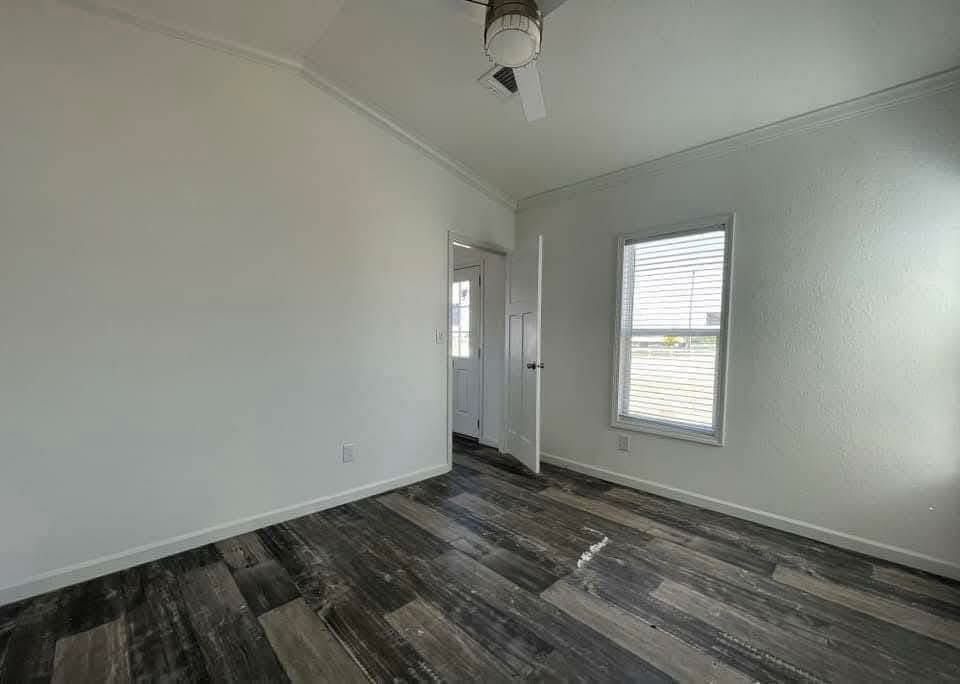 Modern 2-Bed 758 Sq Ft — Trey Ceiling & Island Bar thumbnail 6